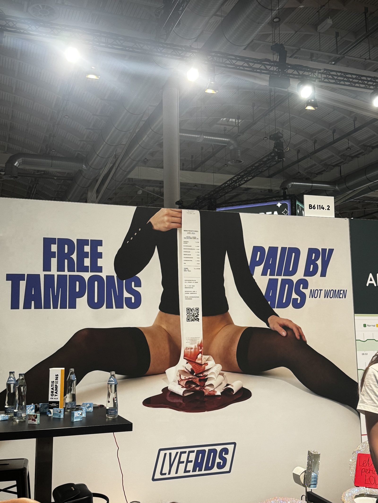 LYFEADS booth: Free tampons, paid by ads, not women