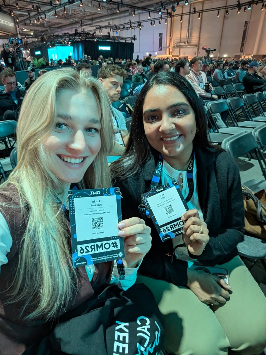 Kirti and Lucia at OMR, holding badges